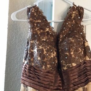 Fully lined formal gown never worn!! Women’s size 6/8. Bronze/ nude underlining